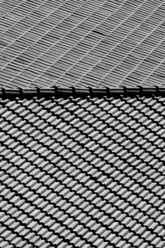 Close-up of durable metal roof panels with protective mesh, ideal for hurricane-resistant Tampa Bay homes